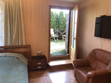 Фото номера Четырехместный номер с террасой Проживание в семье Family house room г. Салацгрива 4