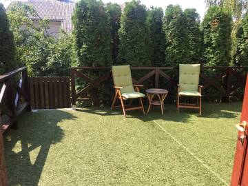 Фото номера Четырехместный номер с террасой Проживание в семье Family house room г. Салацгрива 11